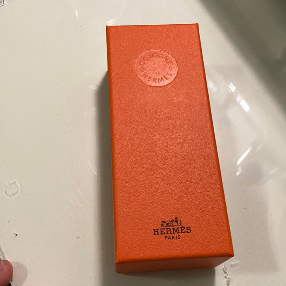 Hermès empty cologne box.